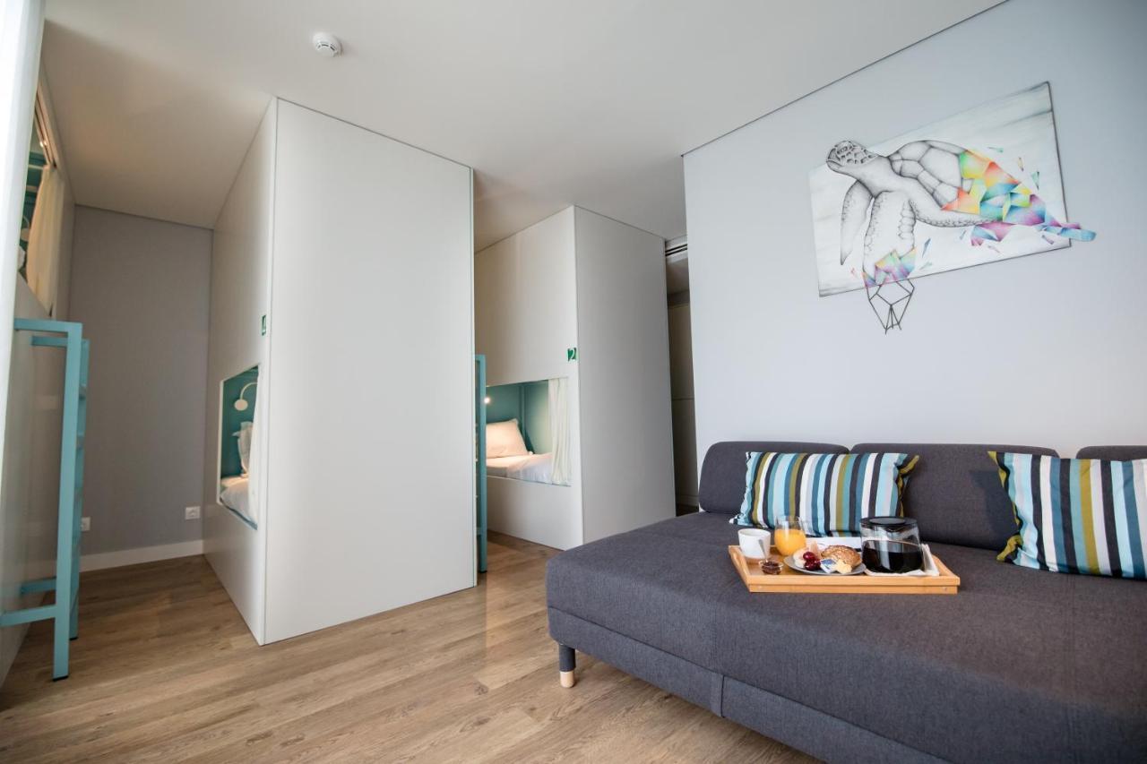 Ilha Hostel & Suites ปอนตาเดลกาดา ภายนอก รูปภาพ
